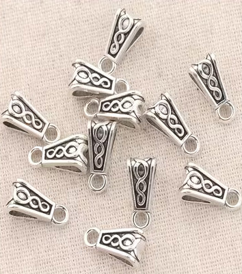 15 mm trevägs distanspärlor med urholkat mönster silver